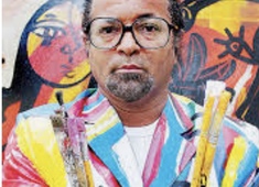 Menelaw Sete  no telão em Paris